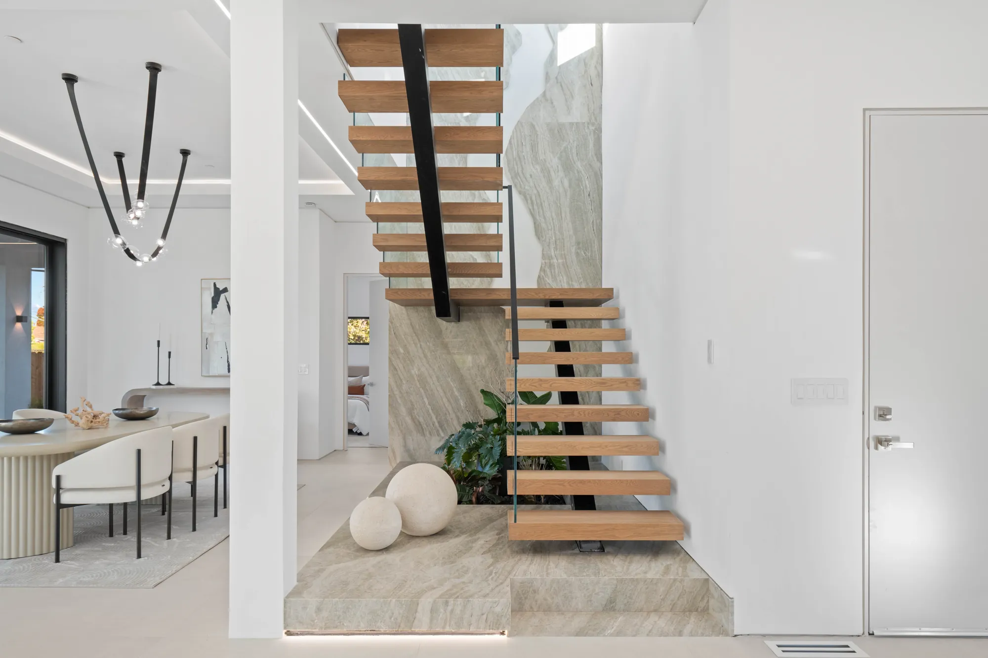 Luxury home addition and renovation featuring expanded living spaces and modern design elements