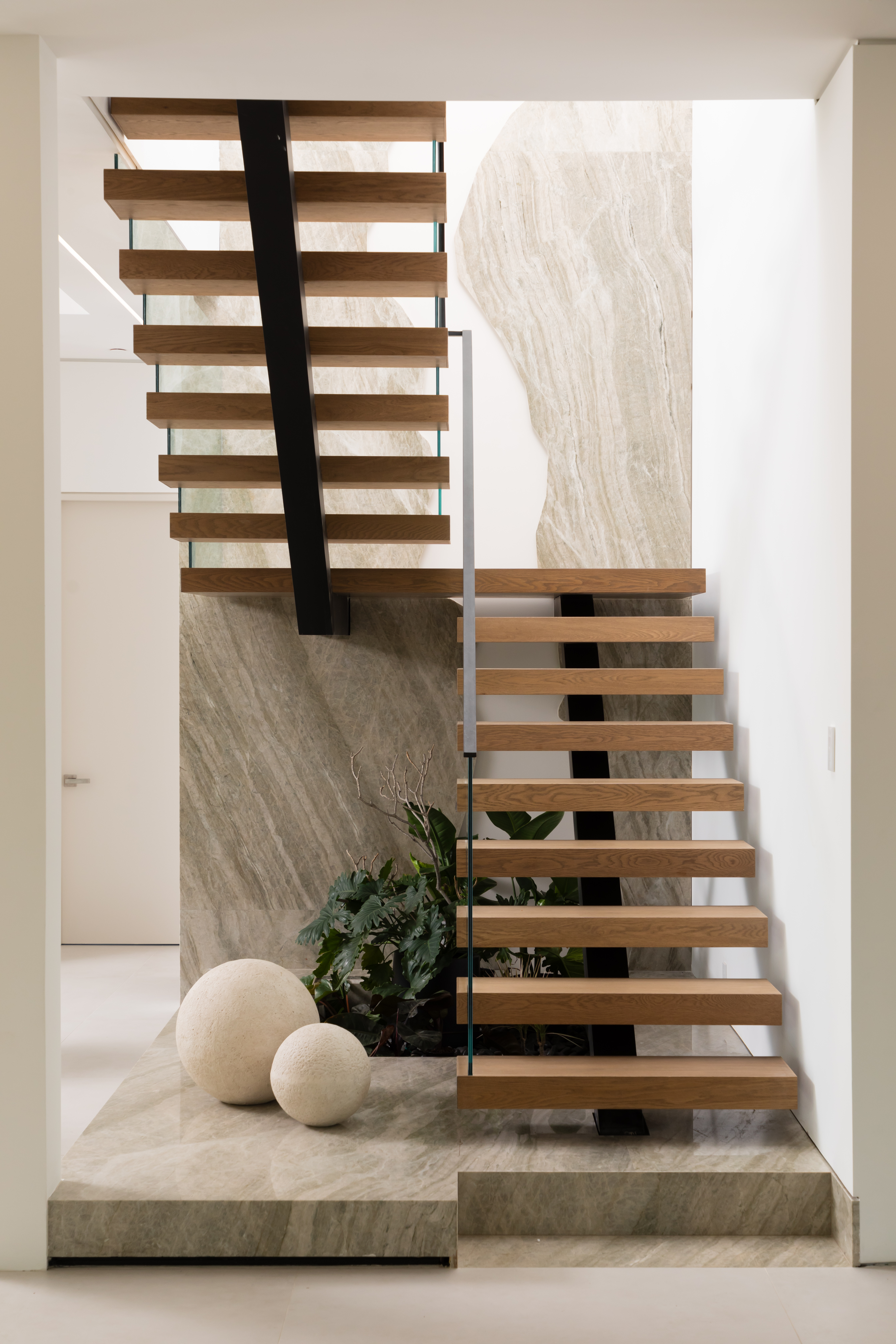 Architect-led structural design and custom staircase in a Bay Area replacement home