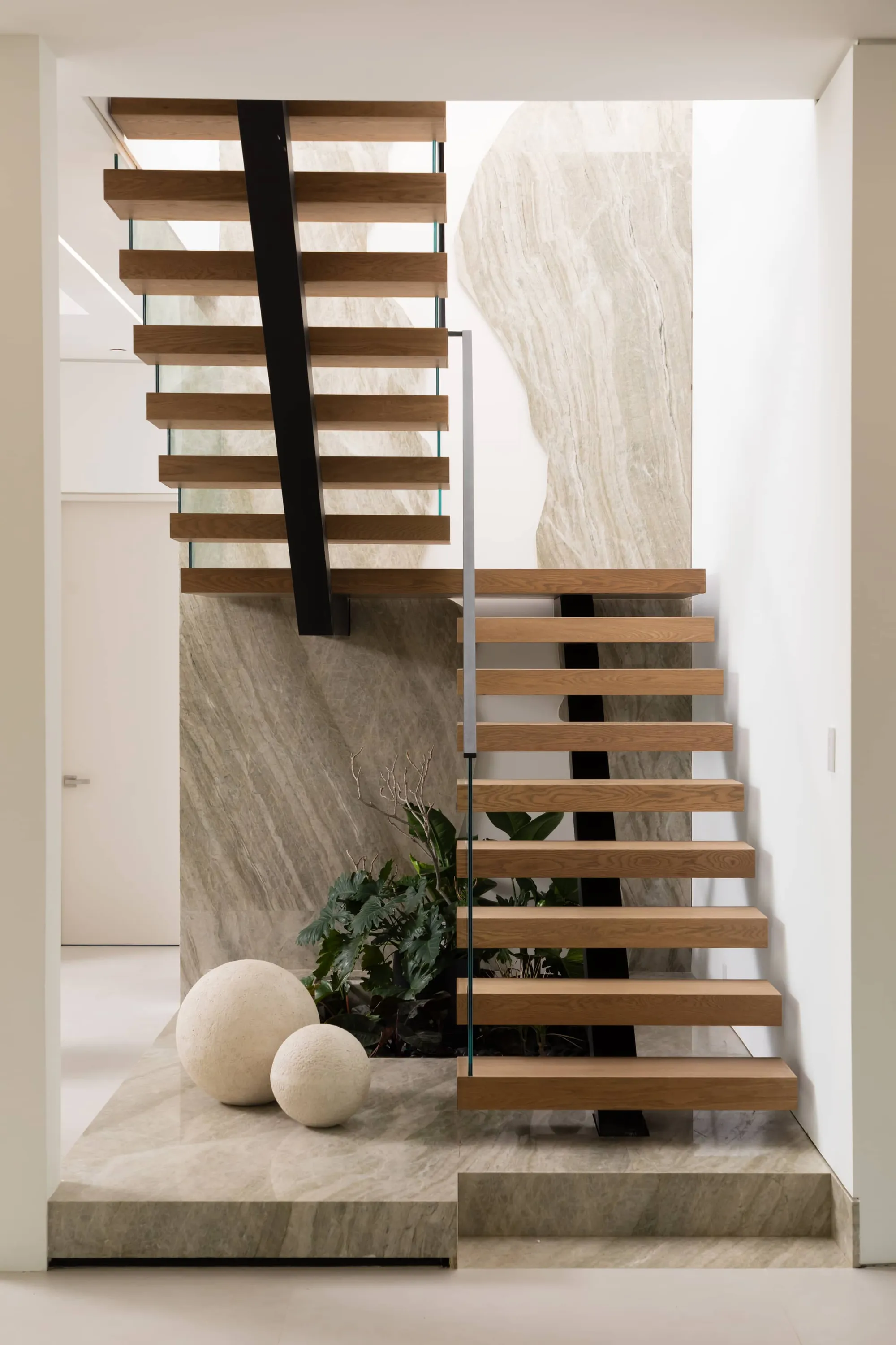 Architect-led structural design and custom staircase in a Bay Area replacement home